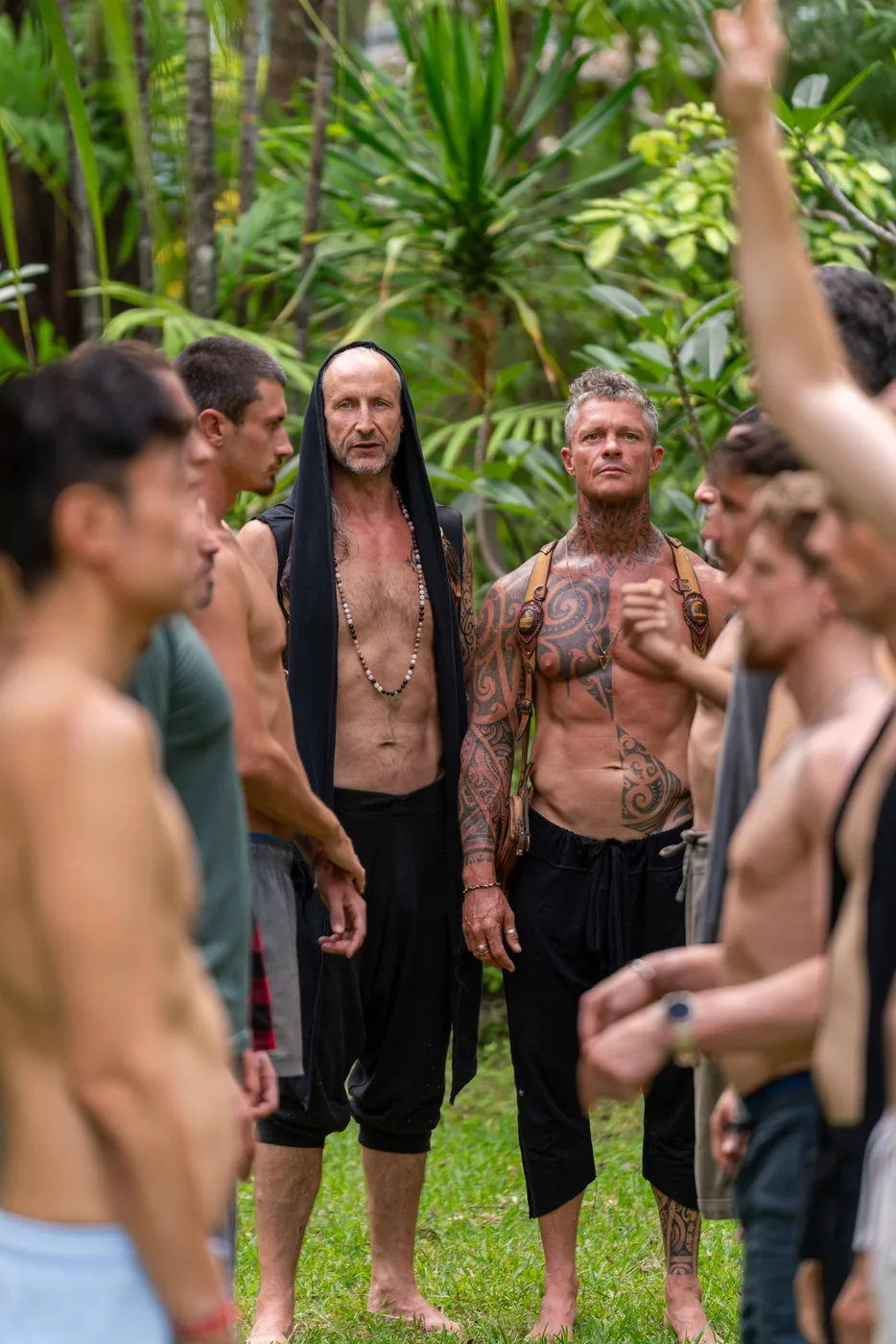 Steve Shiva and Mikkail standing among the men at Rites of Passage